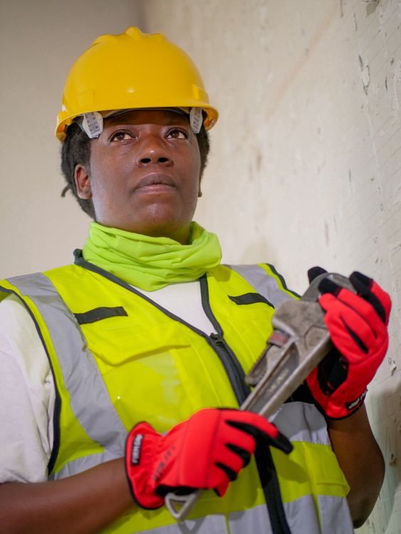 Plumber with wrench